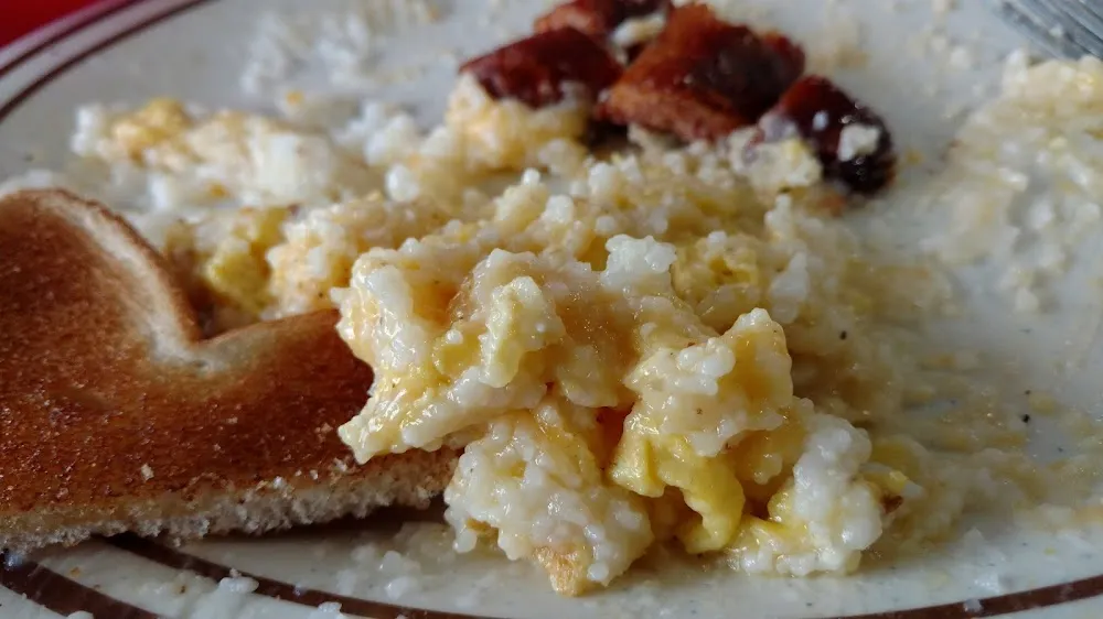 Scrambled Eggs Toast Cheese Grits and Smoked Sausage